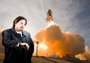 A man waits impatiently for the space shuttle to launch