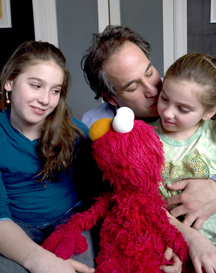 Watch your hand, Elmo. You're cutting in on that pedo's action. about.dad girls elmo When Families Grieve A Very Special PBS Special